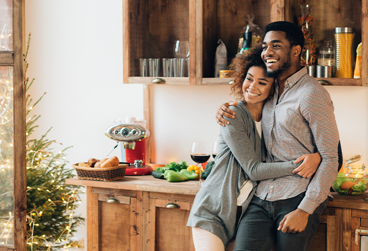 Couple hugging in the kitchen