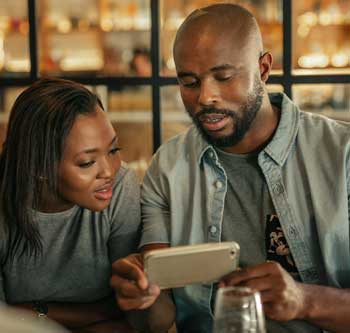 Couple sharing a smartphone